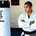 유도 장비의 AS 정책 - A professional dojo setting in a Middle Eastern gym, featuring a skilled judo athlete wearing a clea...